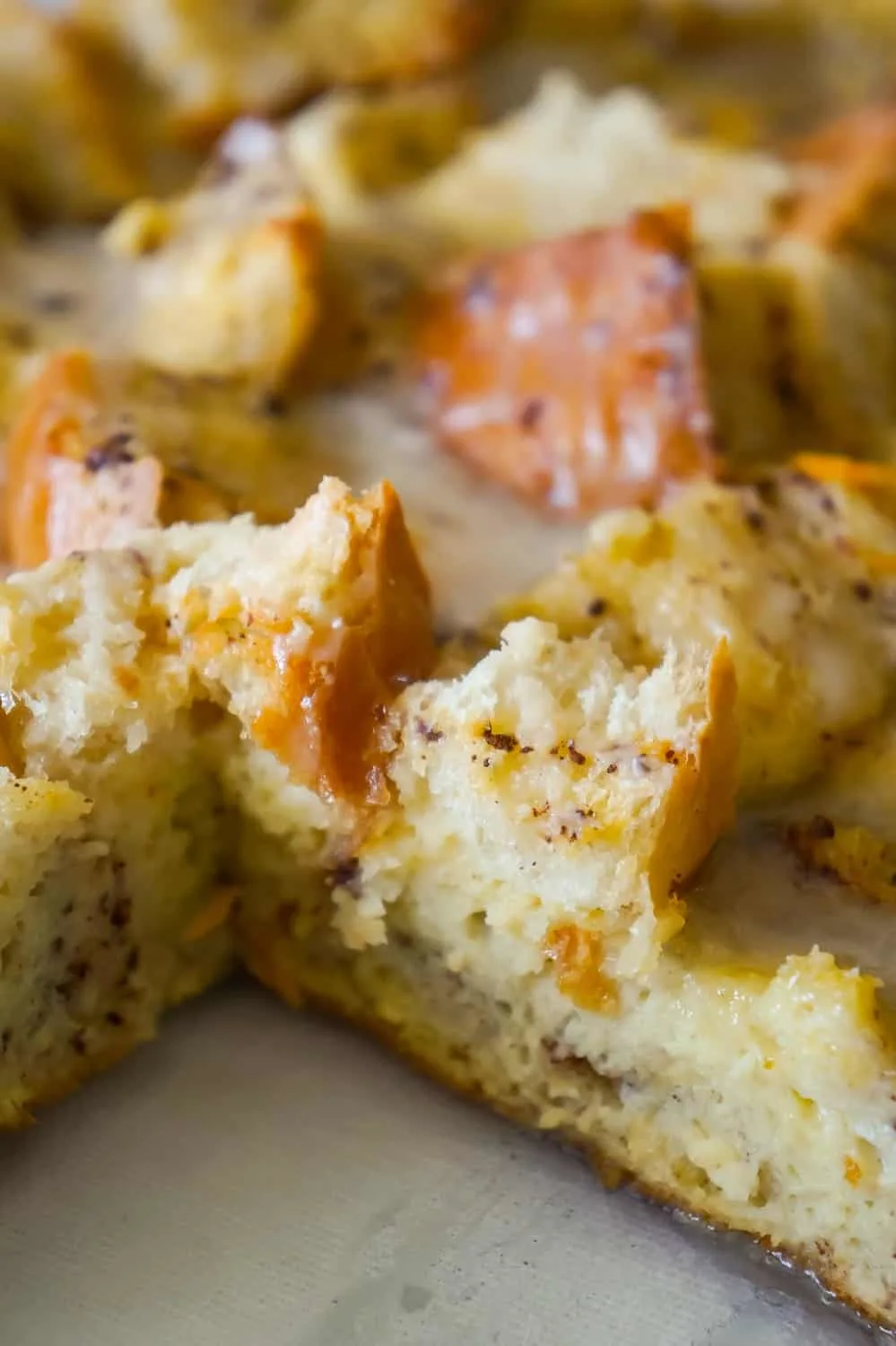 Overnight French Toast Casserole is an easy breakfast casserole recipe made with crusty French bread soaked in an egg mixture flavoured with ground cinnamon, fresh squeezed orange juice and orange zest.