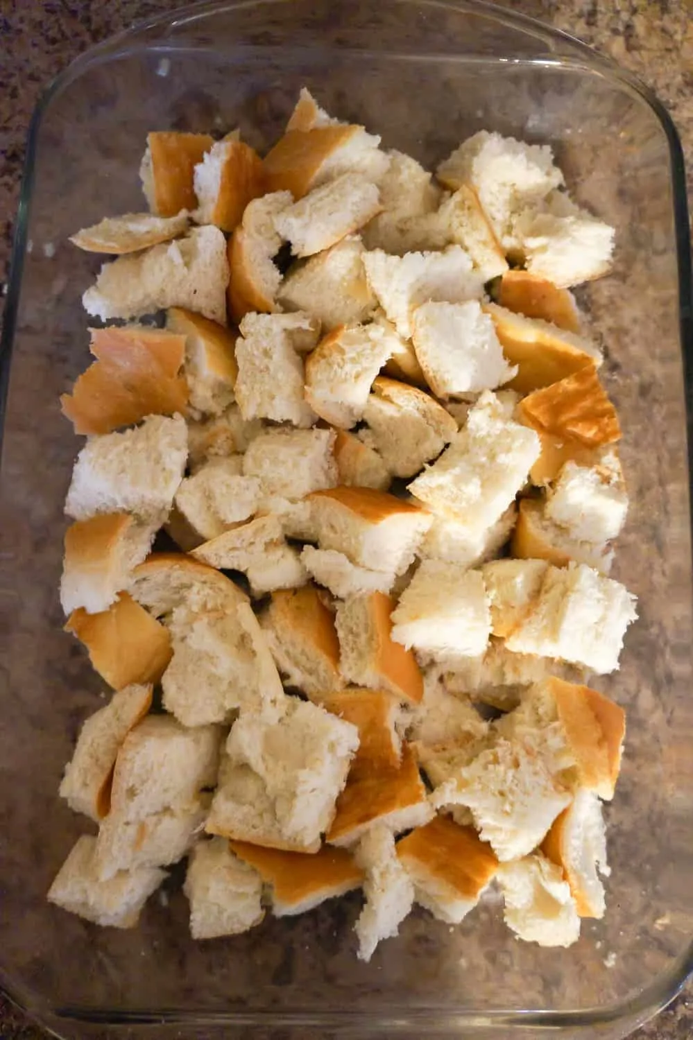 cubes of bread in a baking dish