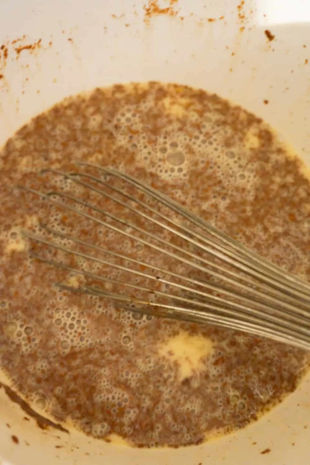 egg and cinnamon mixture in a mixing bowl