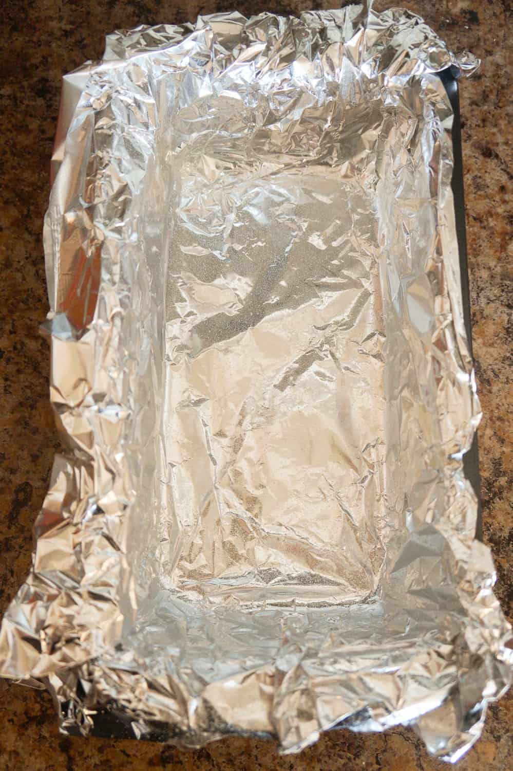loaf pan lined with aluminum foil