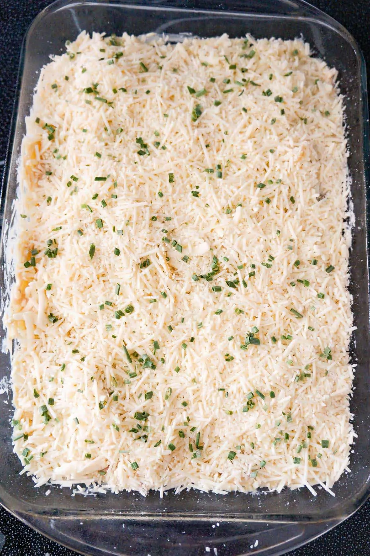 shredded mozzarella, Parmesan and chopped chives on top of turkey tetrazzini before baking