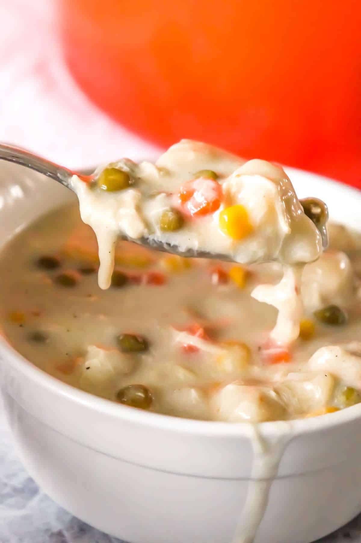 Chicken and Dumplings Soup is a hearty soup recipe using shredded rotisserie chicken, loaded with veggies and Pillsbury biscuit dumplings.