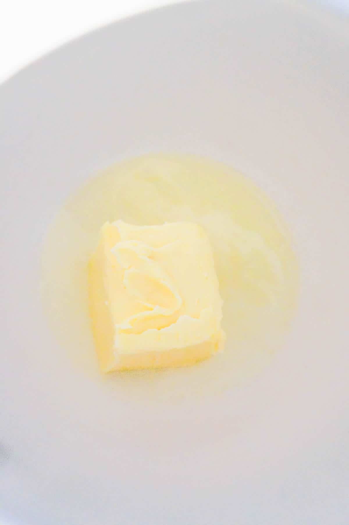 butter and egg whites in a mixing bowl