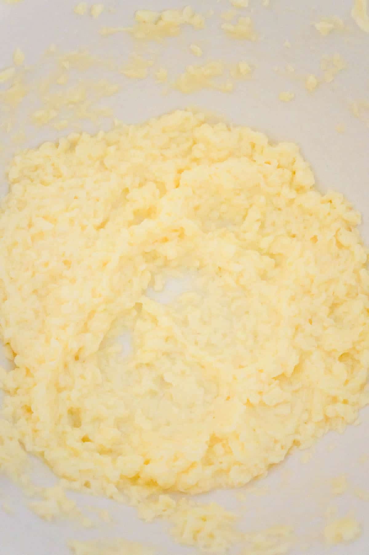 butter and egg white mixture in a mixing bowl