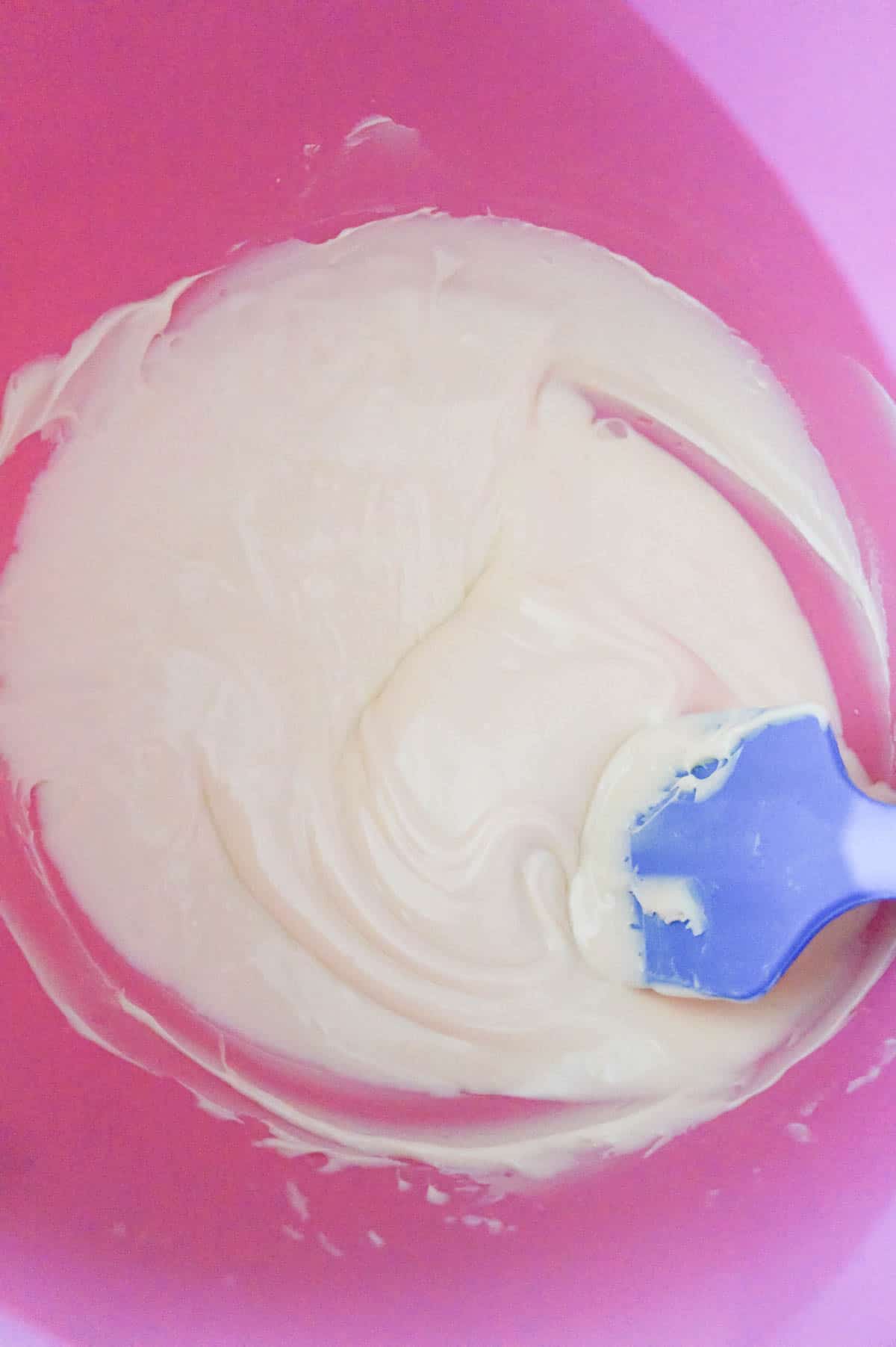 melted white chocolate in a mixing bowl