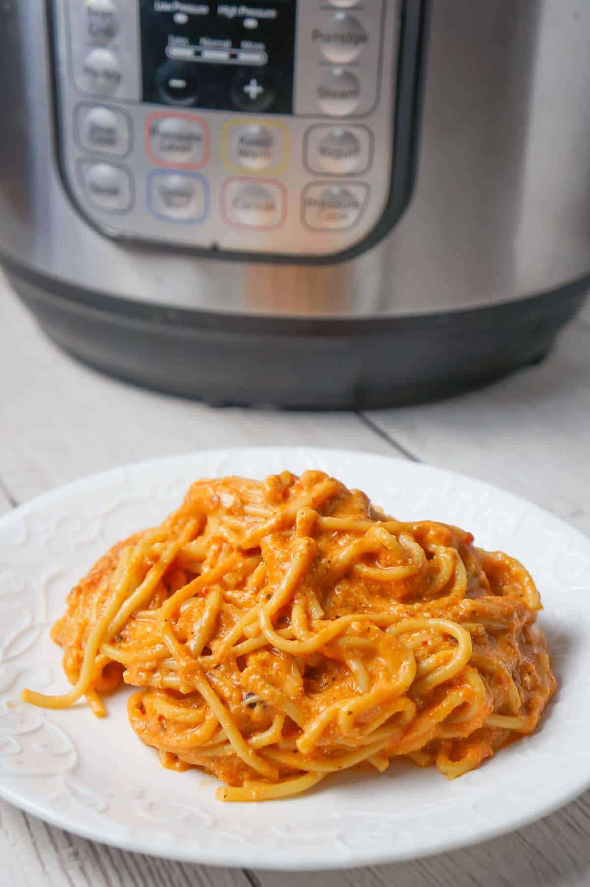 Instant Pot Spaghetti with Ricotta is an easy weeknight dinner recipe made with canned marinara sauce and loaded with mozzarella, cheddar and ricotta cheese.