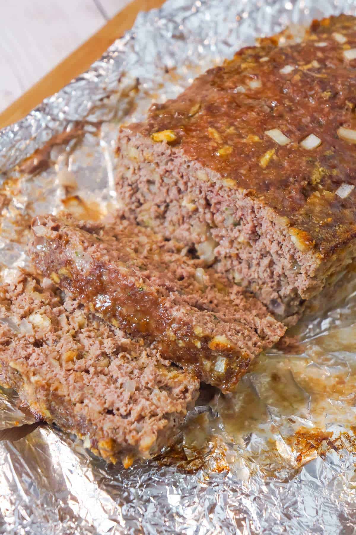 Meatloaf with Gravy is an easy 2 pound ground beef meatloaf recipe made with Stove Top stuffing mix and served with homemade gravy.