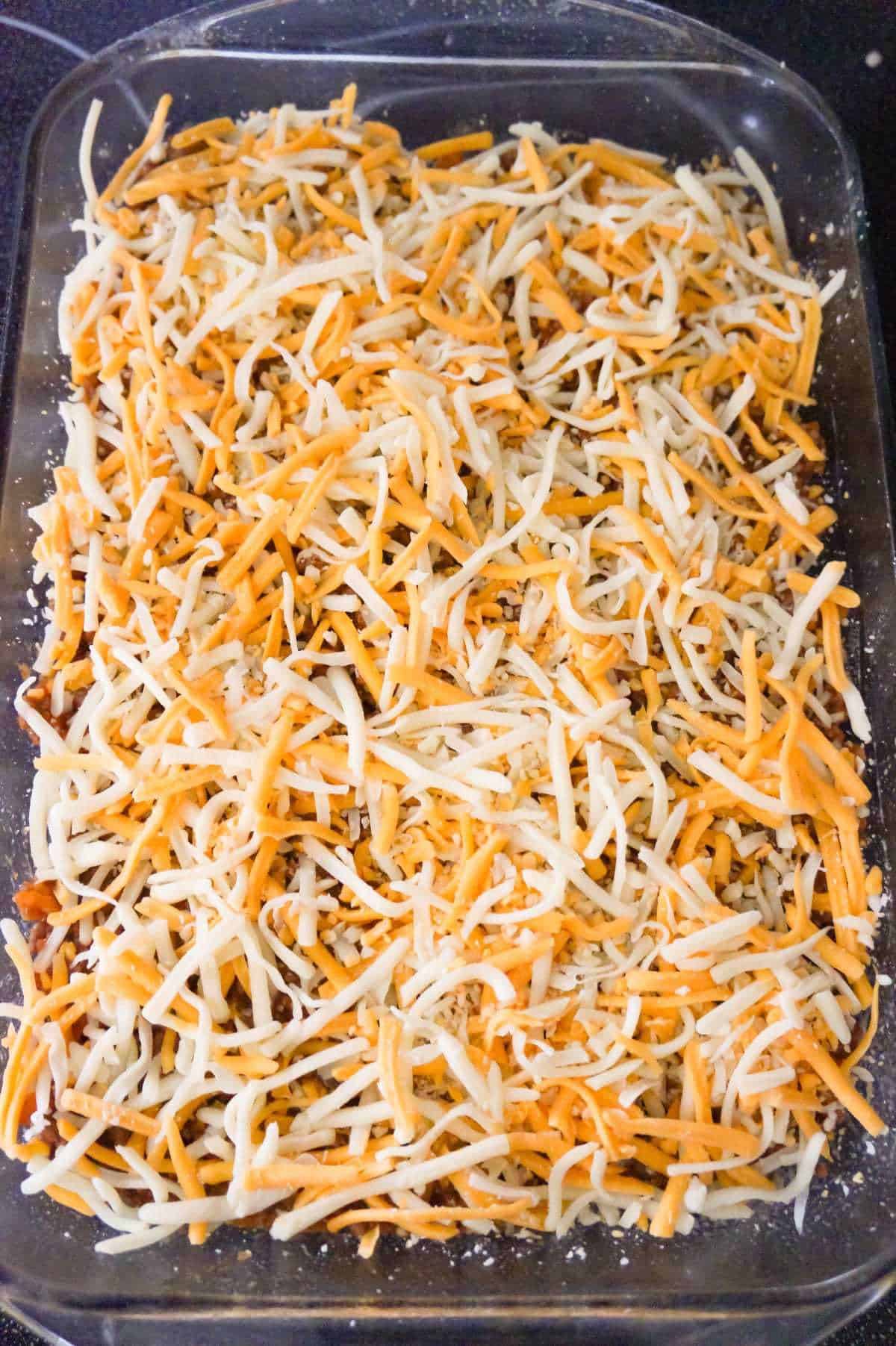 pillsbury biscuit pieces on top of sloppy joe casserole before baking