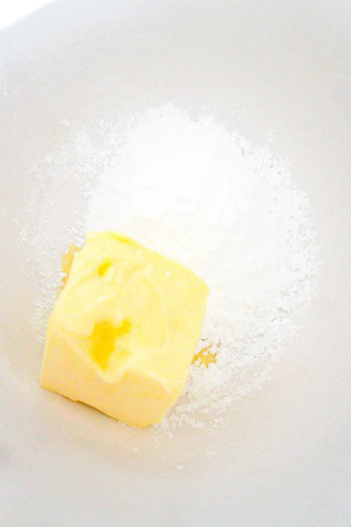 softened butter and confectioner's sugar in a mixing bowl