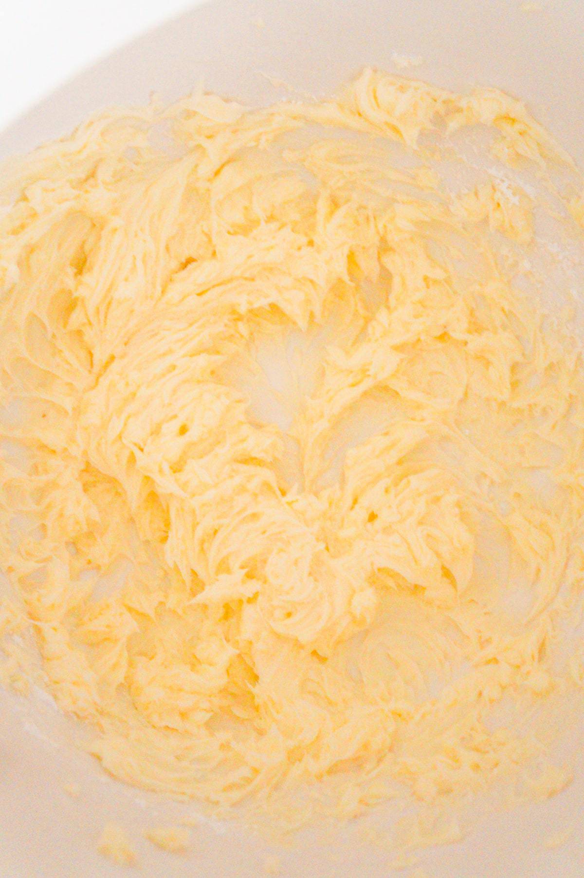 creamed together butter and confectioner's sugar in a mixing bowl