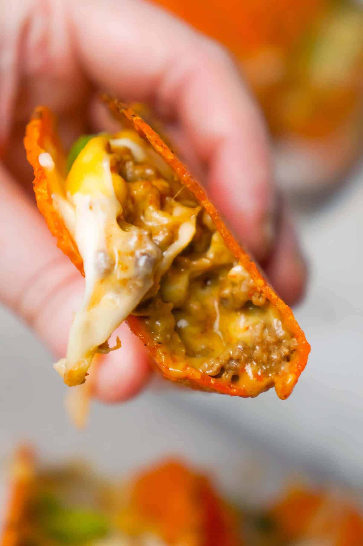 Extra Cheesy Baked Beef Tacos are an easy weeknight dinner recipe using ground beef, salsa con queso cheese dip, shredded mozzarella and cheddar and nacho cheese flavoured stand and stuff taco shells.