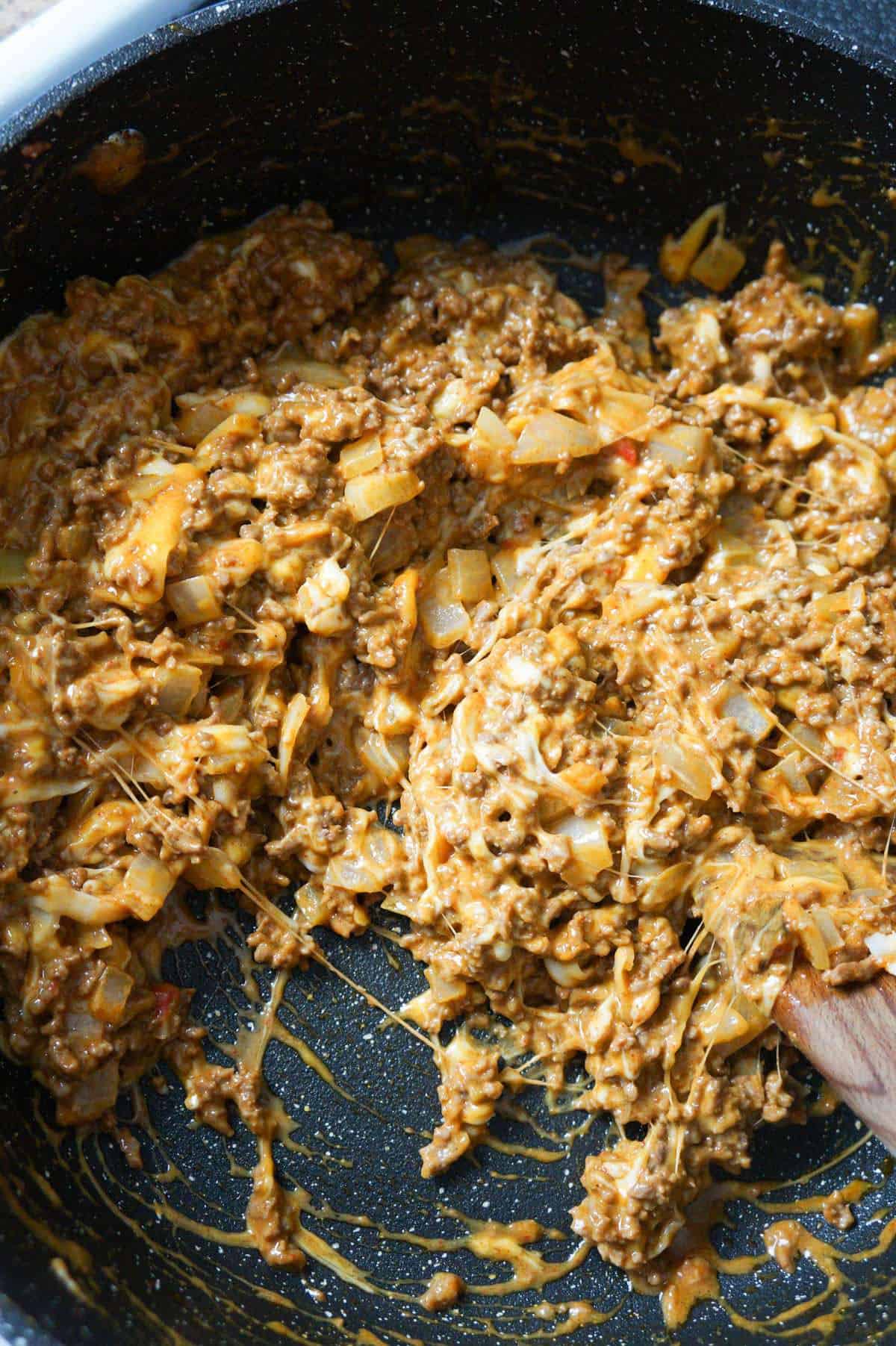 cheesy ground beef mixture in a saute pan