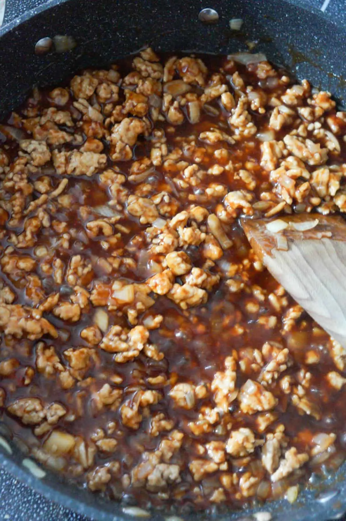 honey bbq ground chicken mixture cooking a saute pan