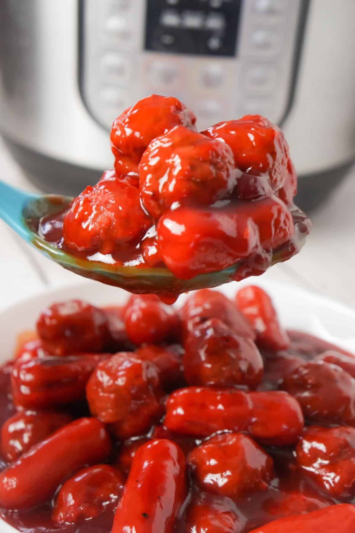 Instant Pot Cherry BBQ Meatballs and Cocktail Wieners are a delicous party snack made with cherry pie filling, Sweet Baby Ray's BBQ sauce and Thai sweet chili sauce.