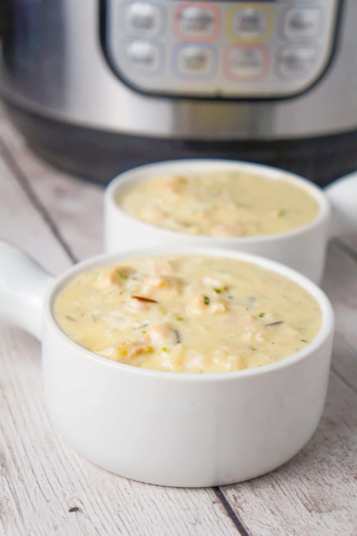 Instant Pot Chicken and Wild Rice Soup is a hearty, creamy soup recipe loaded with chunks of chicken and a long grain and wild rice blend.