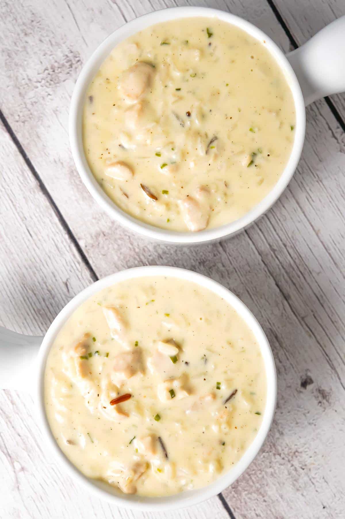 Instant Pot Chicken and Wild Rice Soup is a hearty, creamy soup recipe loaded with chunks of chicken and a long grain and wild rice blend.