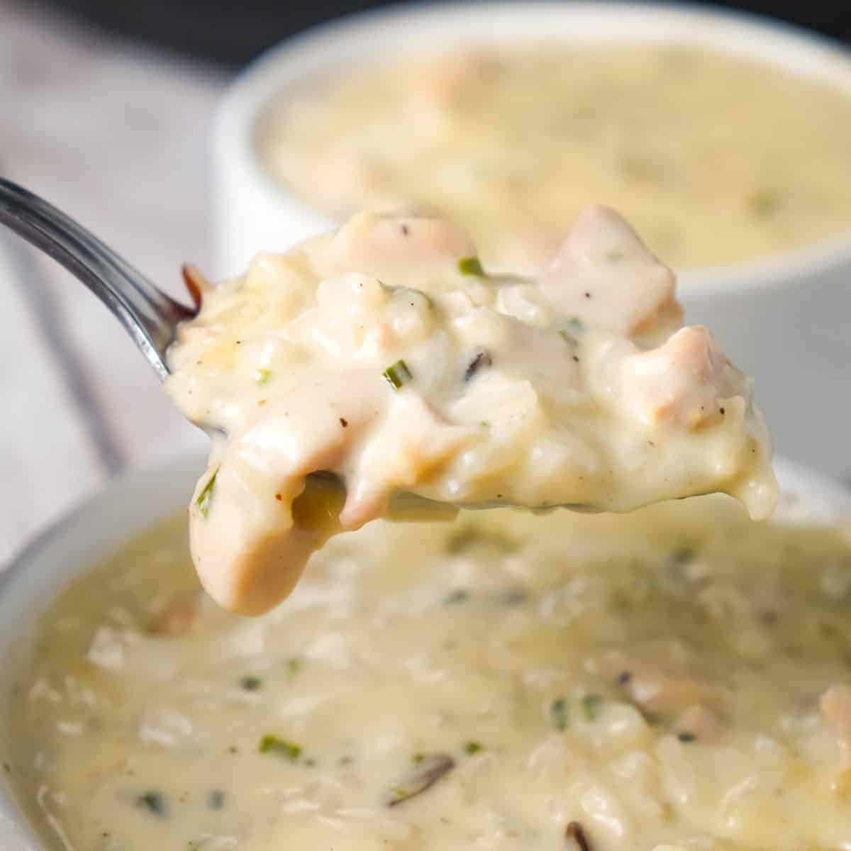 Instant Pot Chicken and Wild Rice Soup is a hearty, creamy soup recipe loaded with chunks of chicken and a long grain and wild rice blend.