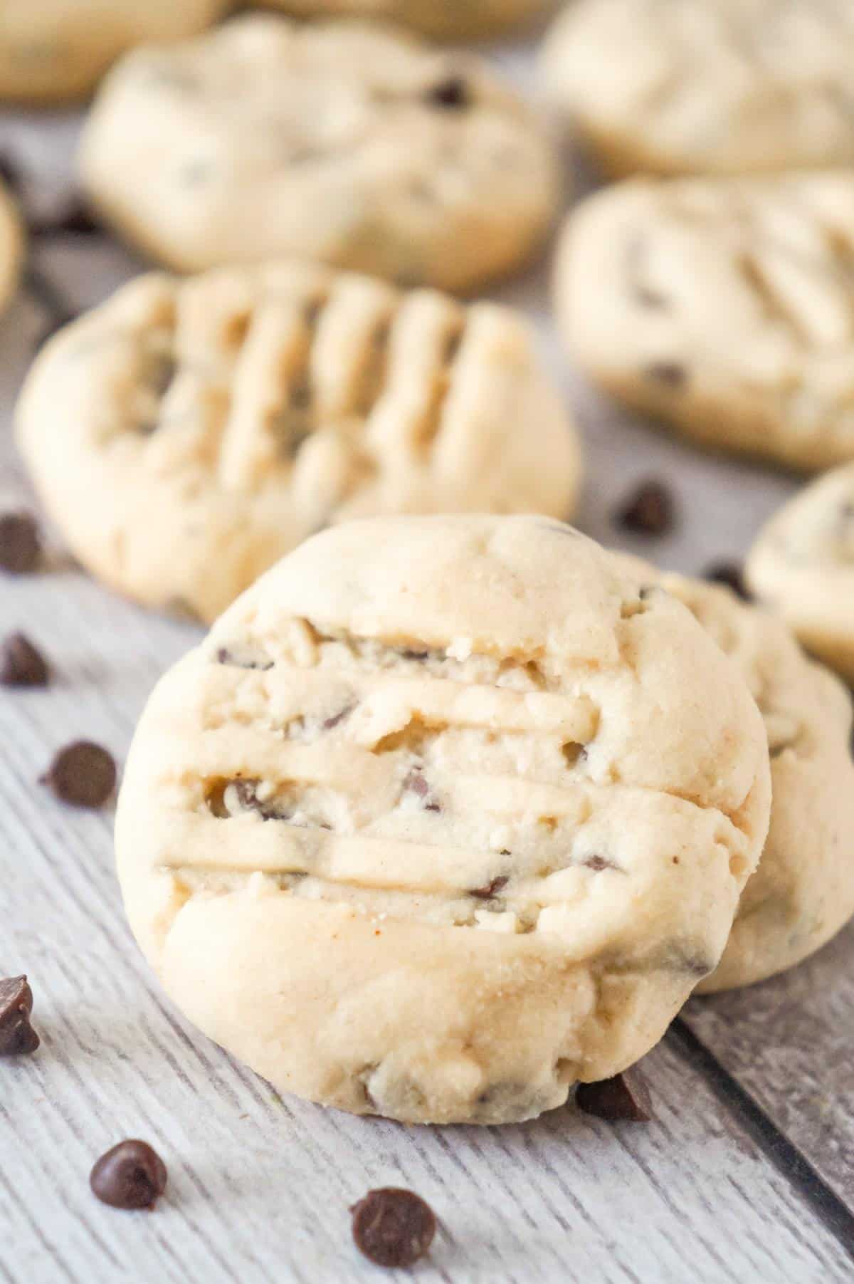 Peanut Butter Chocolate Chip Shortbread Cookies are delicious whipped shortbread cookies loaded with smooth peanut butter and mini chocolate chips.