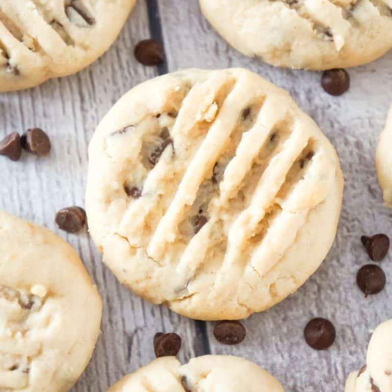 Peanut Butter Chocolate Chip Shortbread Cookies are delicious whipped shortbread cookies loaded with smooth peanut butter and mini chocolate chips.