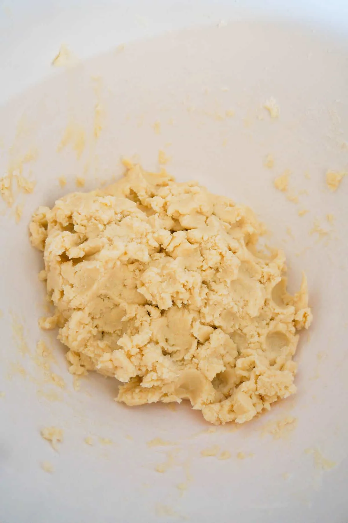 whipped shortbread cookie dough in a mixing bowl