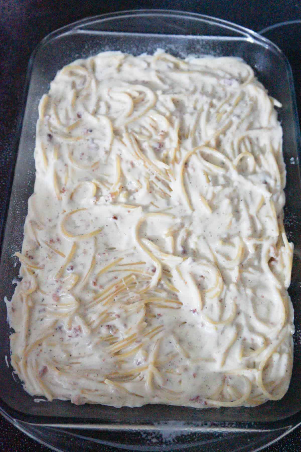 creamy spaghetti in a baking dish