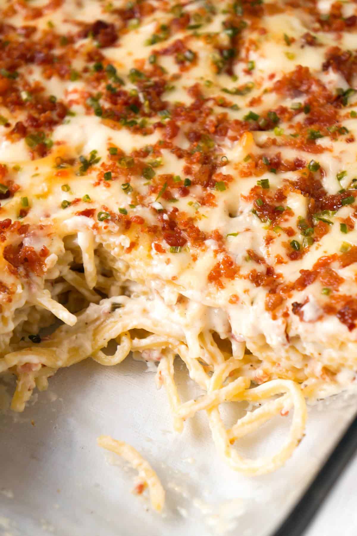 Bacon Cream Cheese Baked Spaghetti is a delicious pasta recipe loaded with crumbled bacon, Philadelphia Whipped Chive cream cheese and mozzarella cheese.