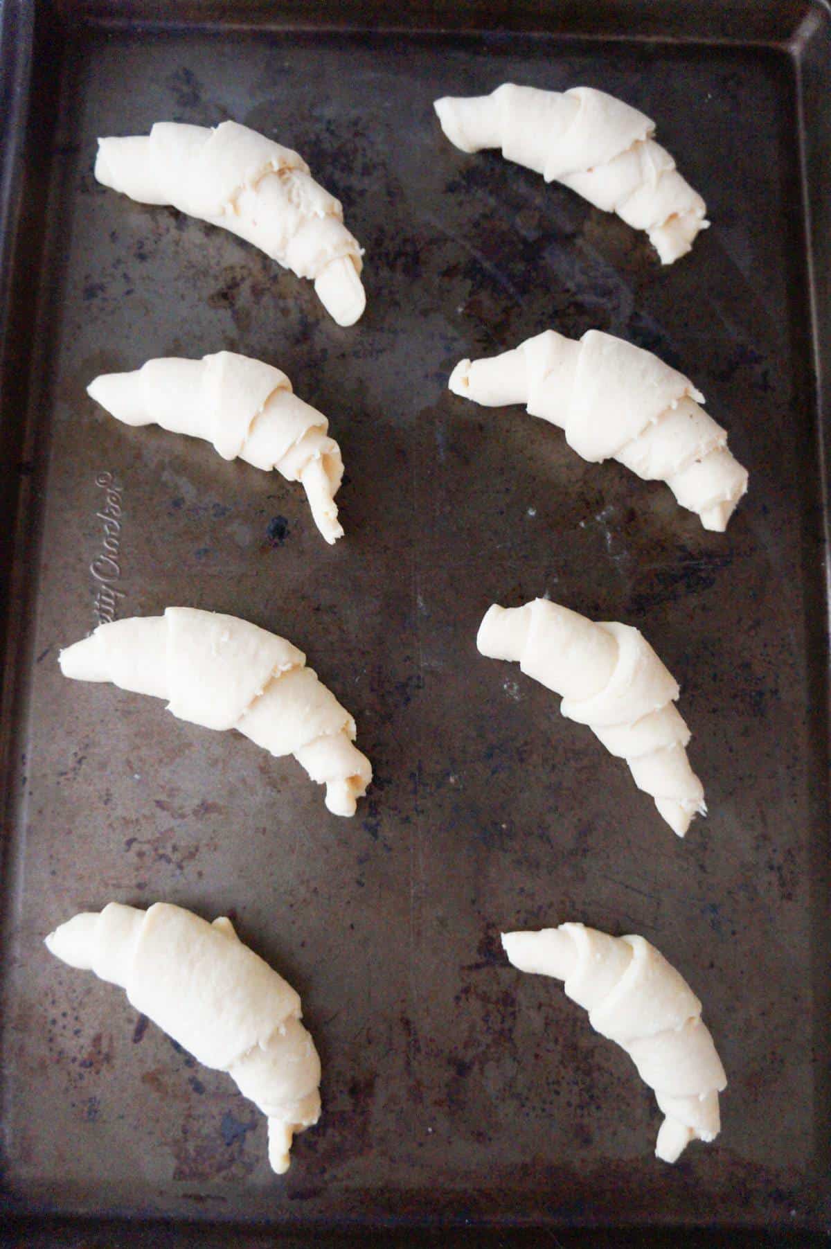 crescent rolls on baking sheet before baking