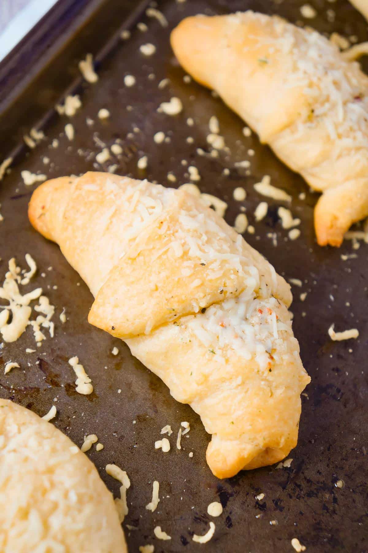 Garlic Parmesan Crescent Rolls are a simple and delicious recipe using Pillsbury crescent rolls, homemade garlic butter and shredded Parmesan cheese.