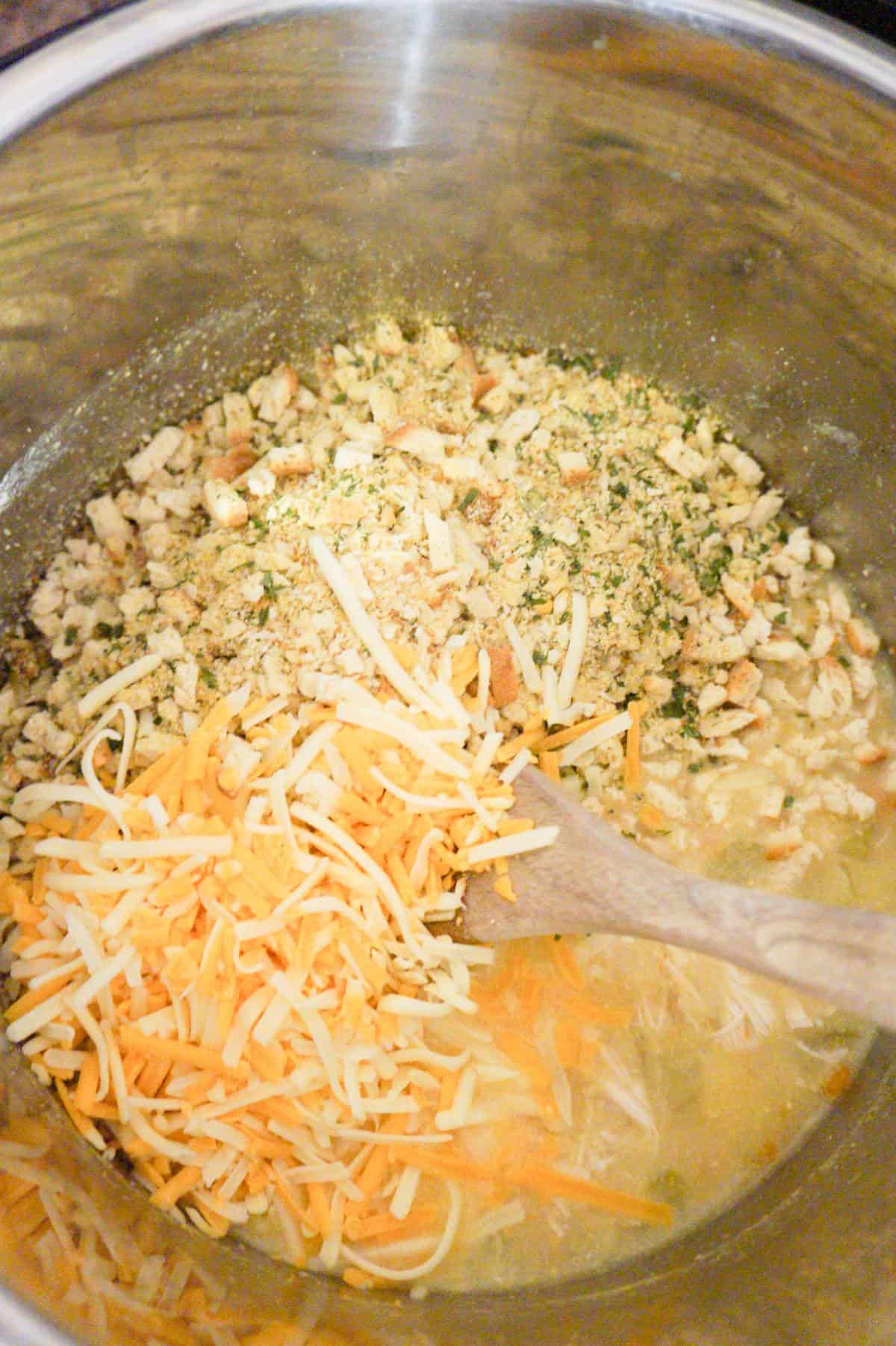 stove top stuffing mix and shredded cheddar cheese in an Instant Pot