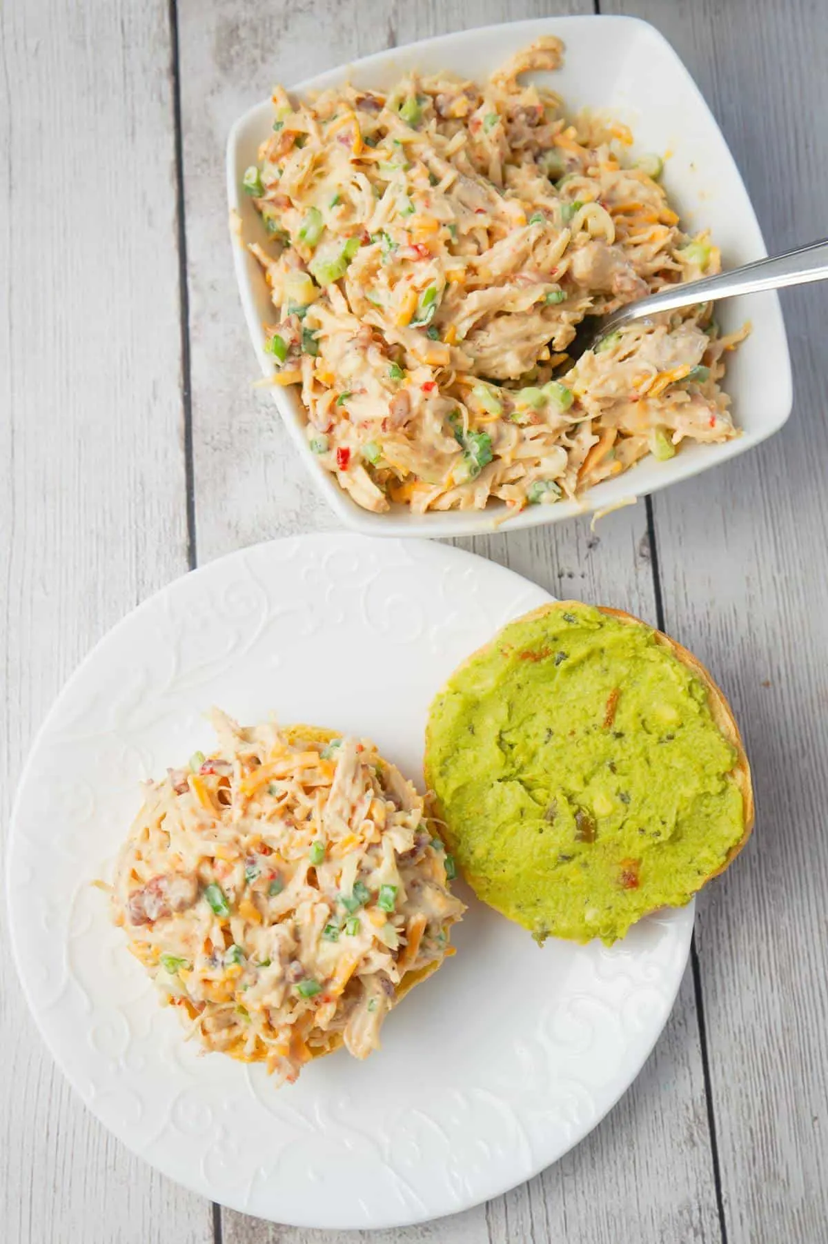Instant Pot Sweet Chili Bacon Chicken Salad Sandwiches are easy lunch or weeknight dinner recipe using boneless, skinless chicken breasts cooked in the Instant Pot and then tossed with mayo, Thai sweet chili sauce, green onions, crumbled bacon and cheese.