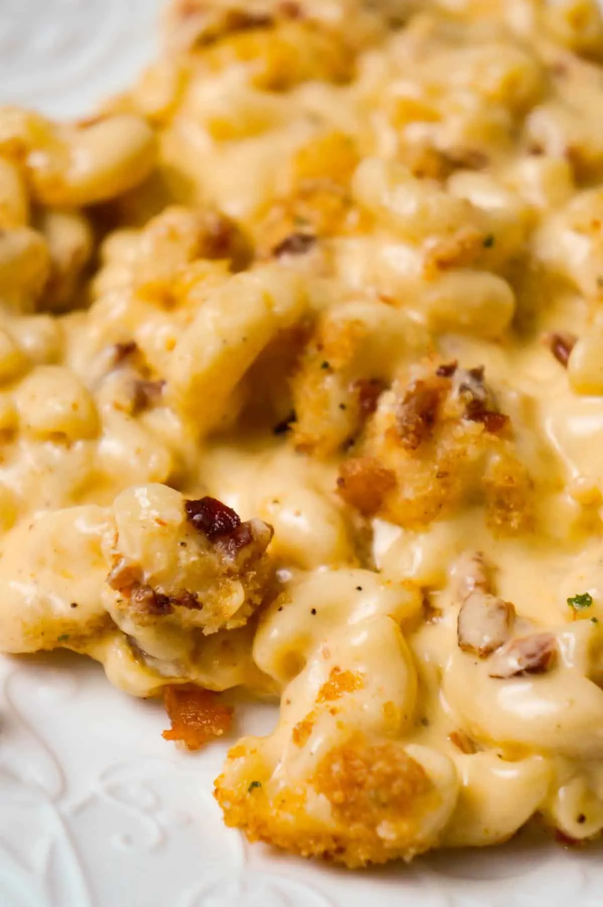 Mac and Cheese with Bacon is a creamy baked macaroni and cheese recipe made with Campbell's condensed cream of bacon soup and loaded with crumbled bacon.