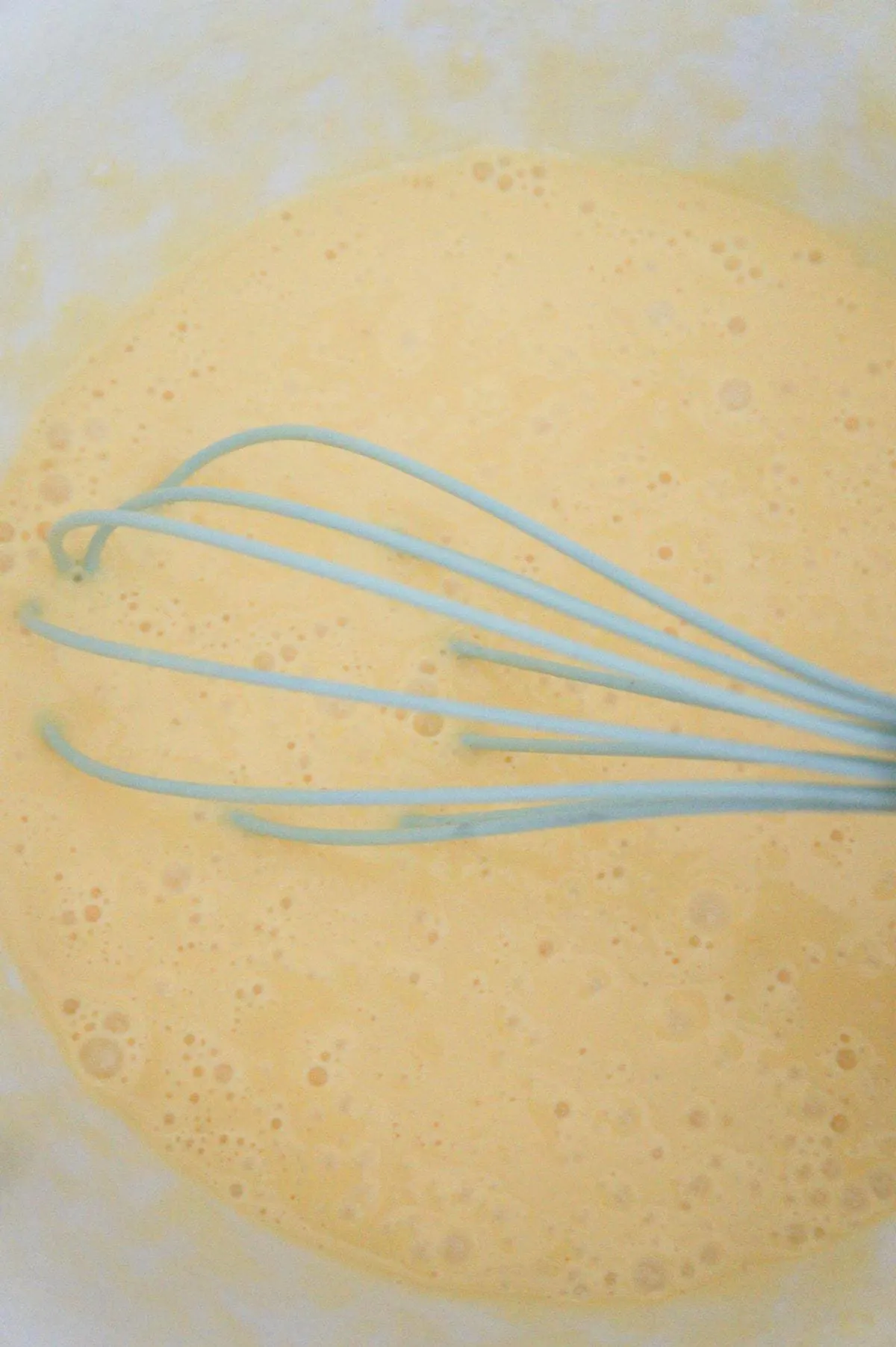 beaten egg mixture in a mixing bowl