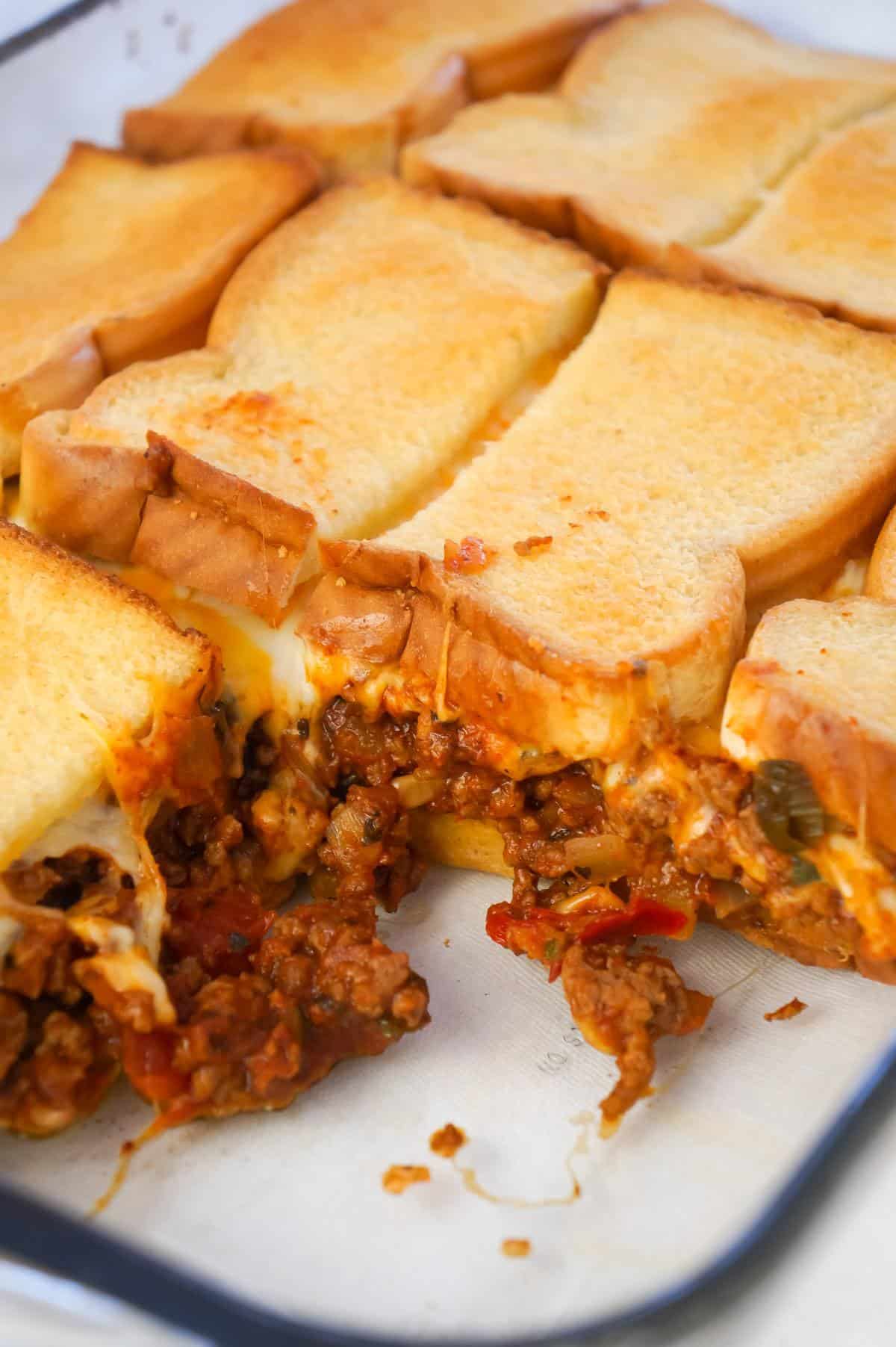 Beef Taco Grilled Cheese Casserole is an easy casserole recipe with layers of toasted bread, cheese and ground beef tossed in salsa, chili sauce and taco seasoning.