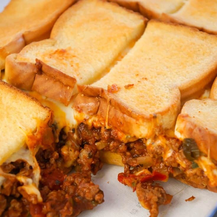 Beef Taco Grilled Cheese Casserole is an easy casserole recipe with layers of toasted bread, cheese and ground beef tossed in salsa, chili sauce and taco seasoning.