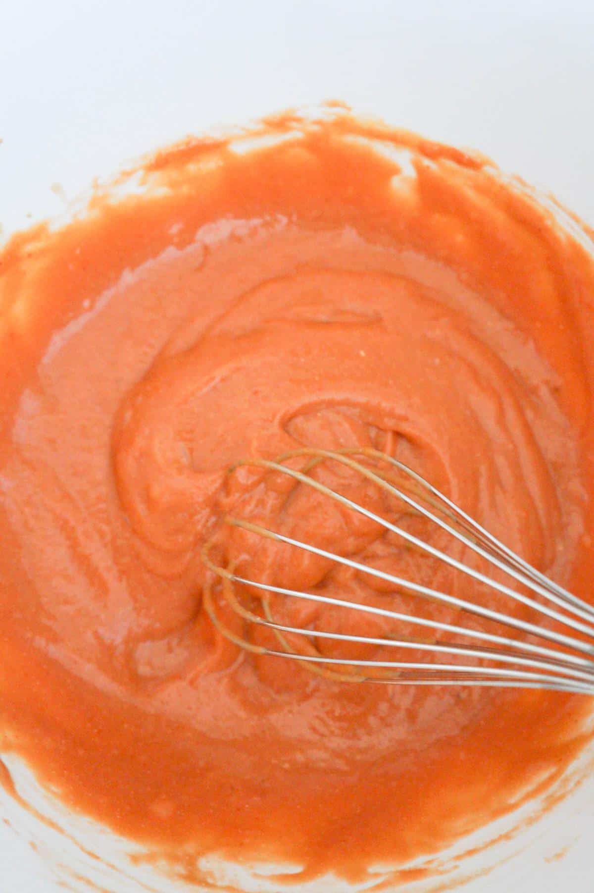 cheesy sloppy joe sauce in a mixing bowl