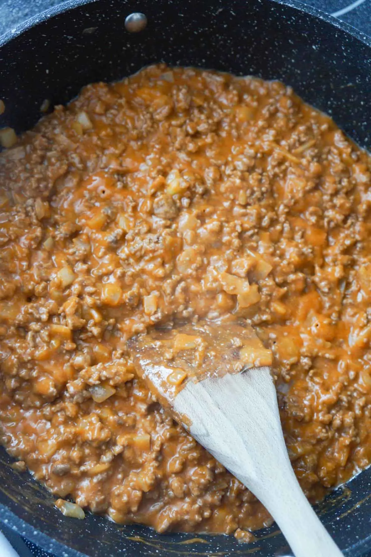 ground beef and sauce mixture in a saute pan