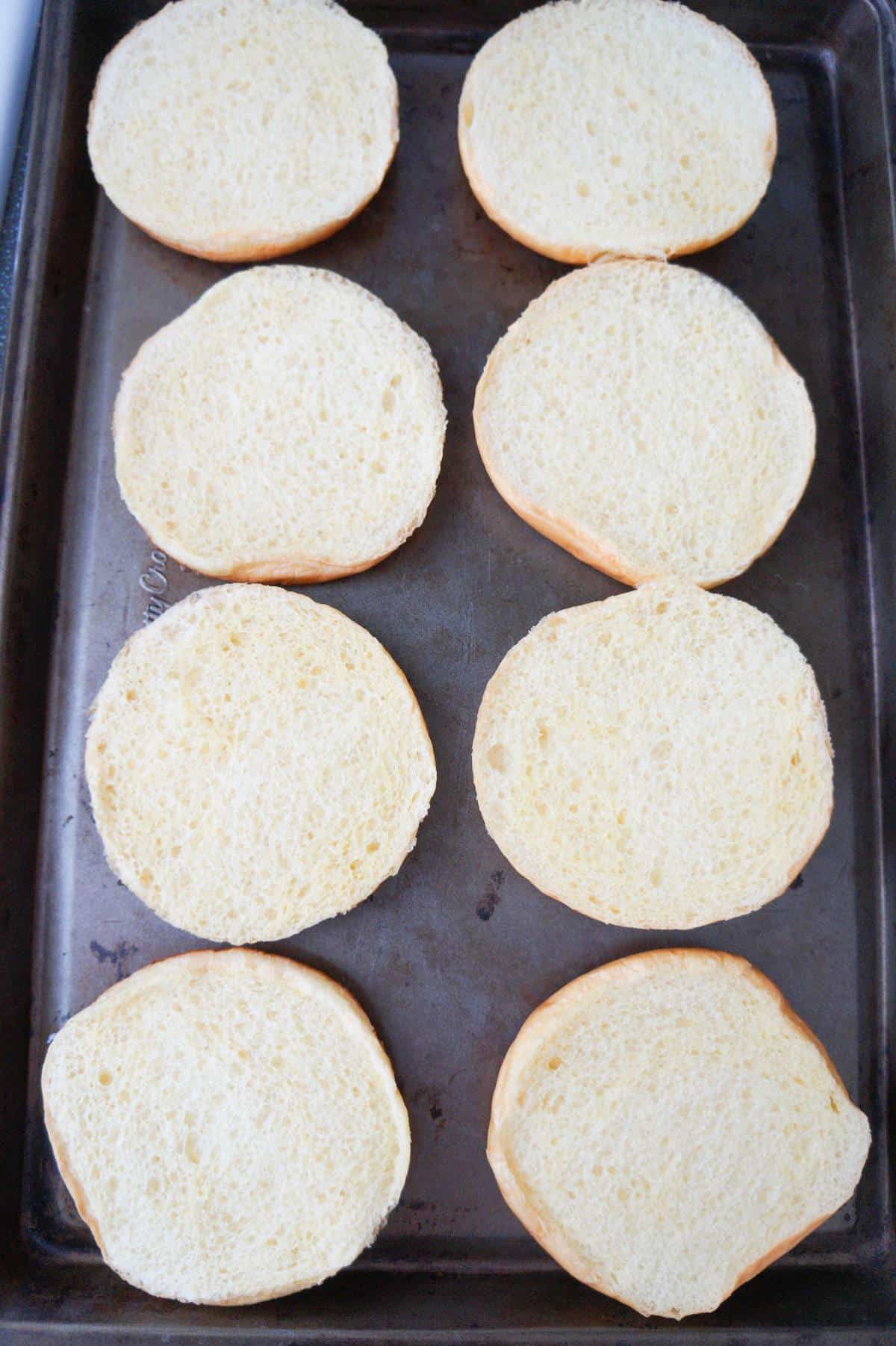 buns in a single layer on a baking sheet