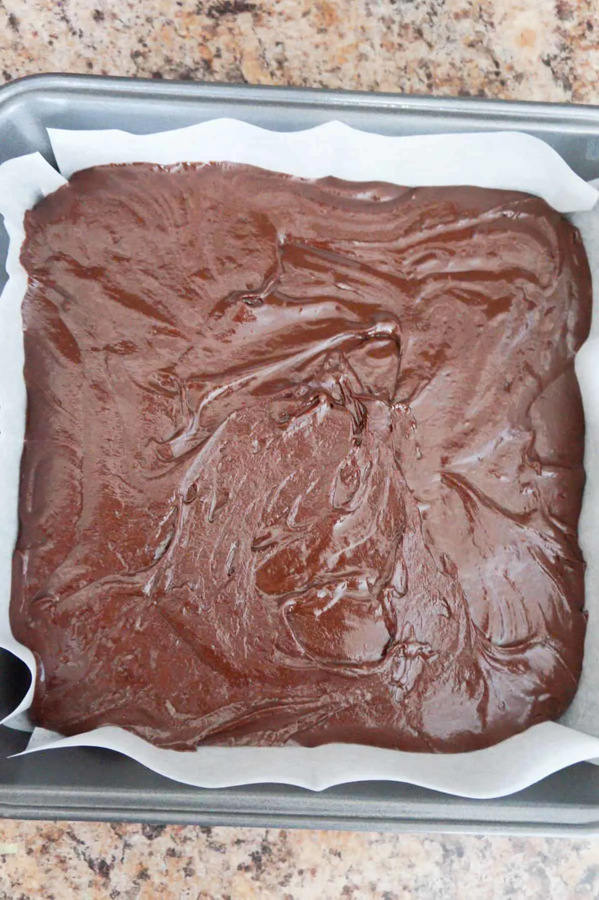 chocolate fudge in a pan before setting