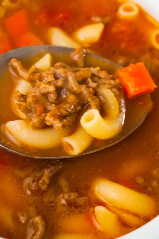 Easy Hamburger Soup with Macaroni is a hearty soup recipe that takes just fifteen minutes from start to finish.This delicious soup is loaded with ground beef, diced tomatoes, mixed vegetables and macaroni noodles.