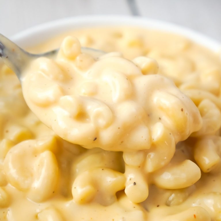 Instant Pot Extra Creamy Mac and Cheese is a simple and delicious pressure cooker pasta recipe made with cheddar cheese soup, heavy cream, mozzarella and cheddar cheese.