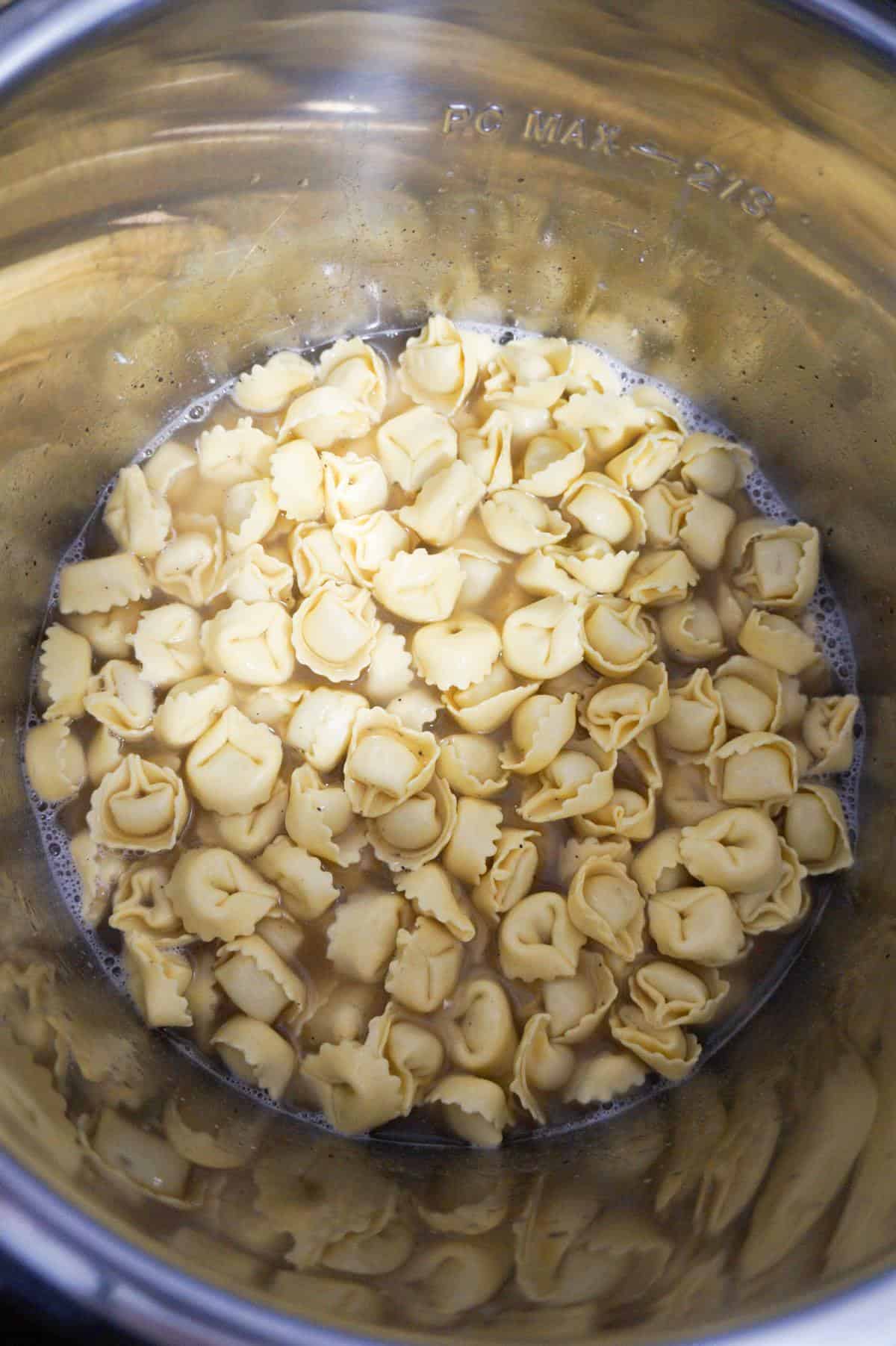 uncooked tortellini in an Instant Pot