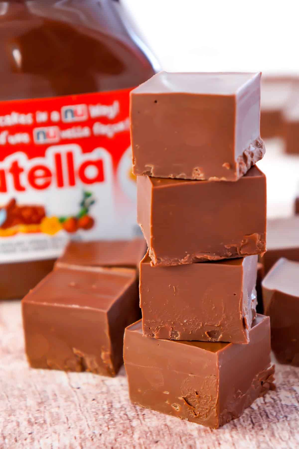 Nutella Fudge is an easy two ingredient microwave fudge recipe using Nutella and milk chocolate chips.