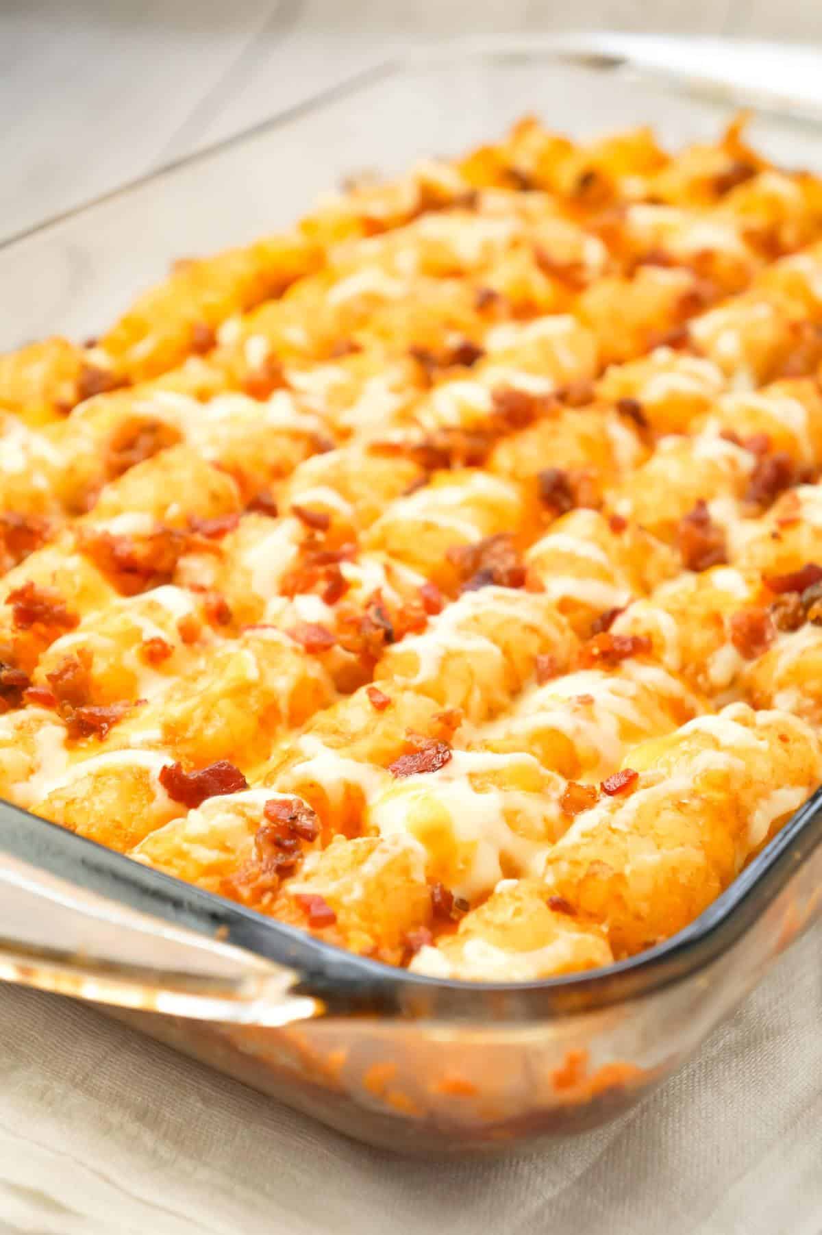 Bacon Cheeseburger Tater Tot Casserole is an easy ground beef dinner recipe loaded with crumbled bacon and cheese, and topped with crispy tater tots.