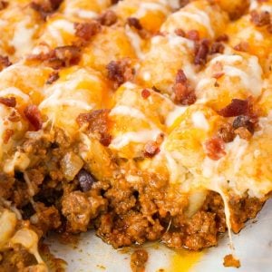 Bacon Cheeseburger Tater Tot Casserole is an easy ground beef dinner recipe loaded with crumbled bacon and cheese, and topped with crispy tater tots.