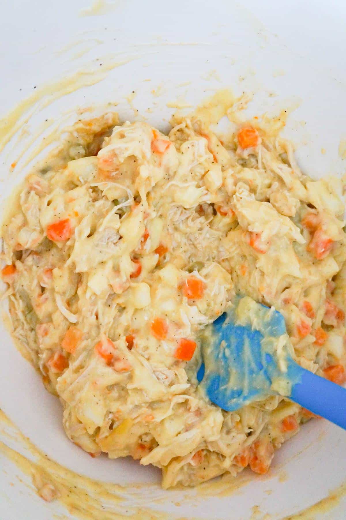 chicken pot pie filling in a mixing bowl