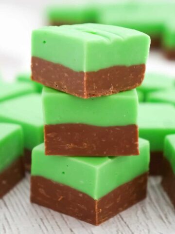 Mint Chocolate Fudge is an easy microwave fudge recipe using sweetened condensed milk, milk chocolate chips, white chocolate chips, green food colouring and mint extract.