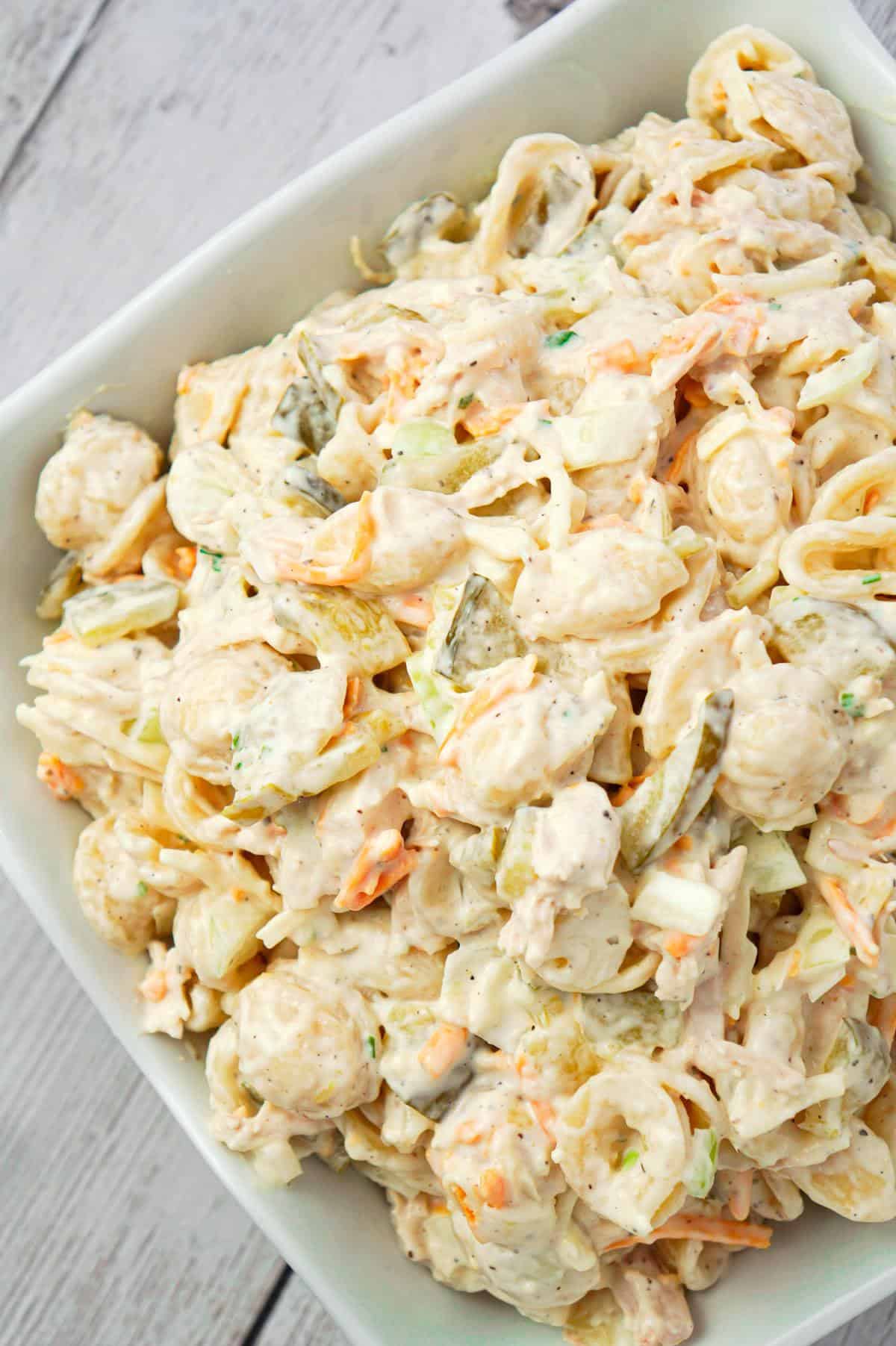 Dill Pickle Chicken Pasta Salad is a delicious cold side dish recipe loaded with shredded chicken, diced dill pickles, mayo, ranch dressing and shredded cheese.