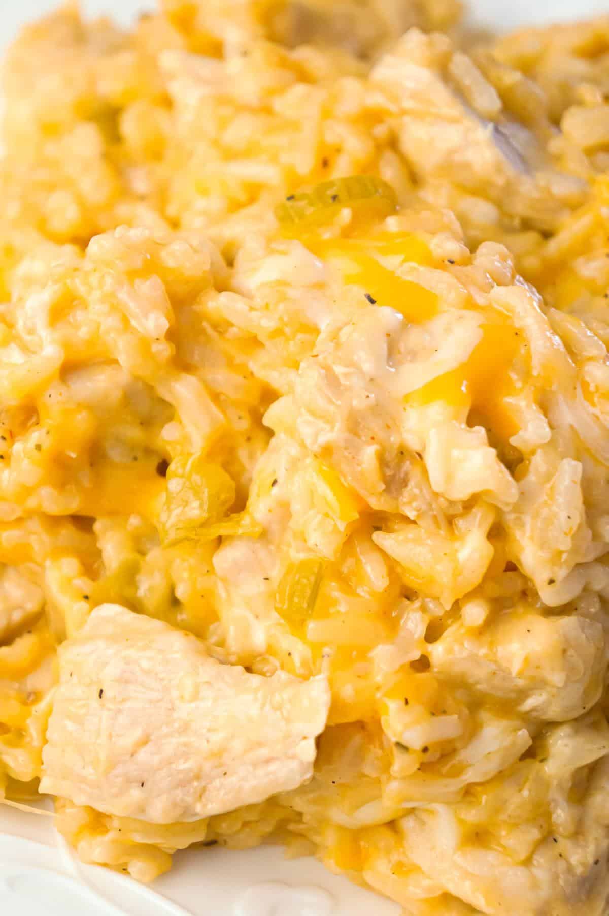 Instant Pot Cheesy Buffalo Chicken and Rice is an easy pressure cooker dinner recipe loaded with chicken breast chunks, long grain white rice, diced celery, buffalo sauce and shredded cheese.