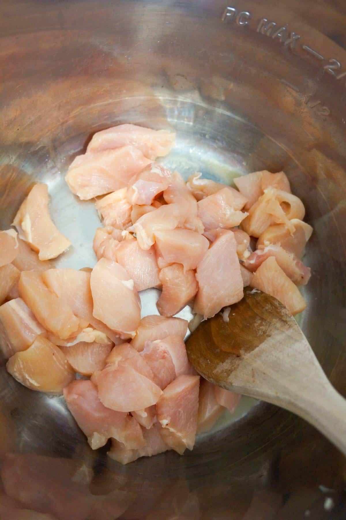 raw chicken breast chunks in an Instant Pot