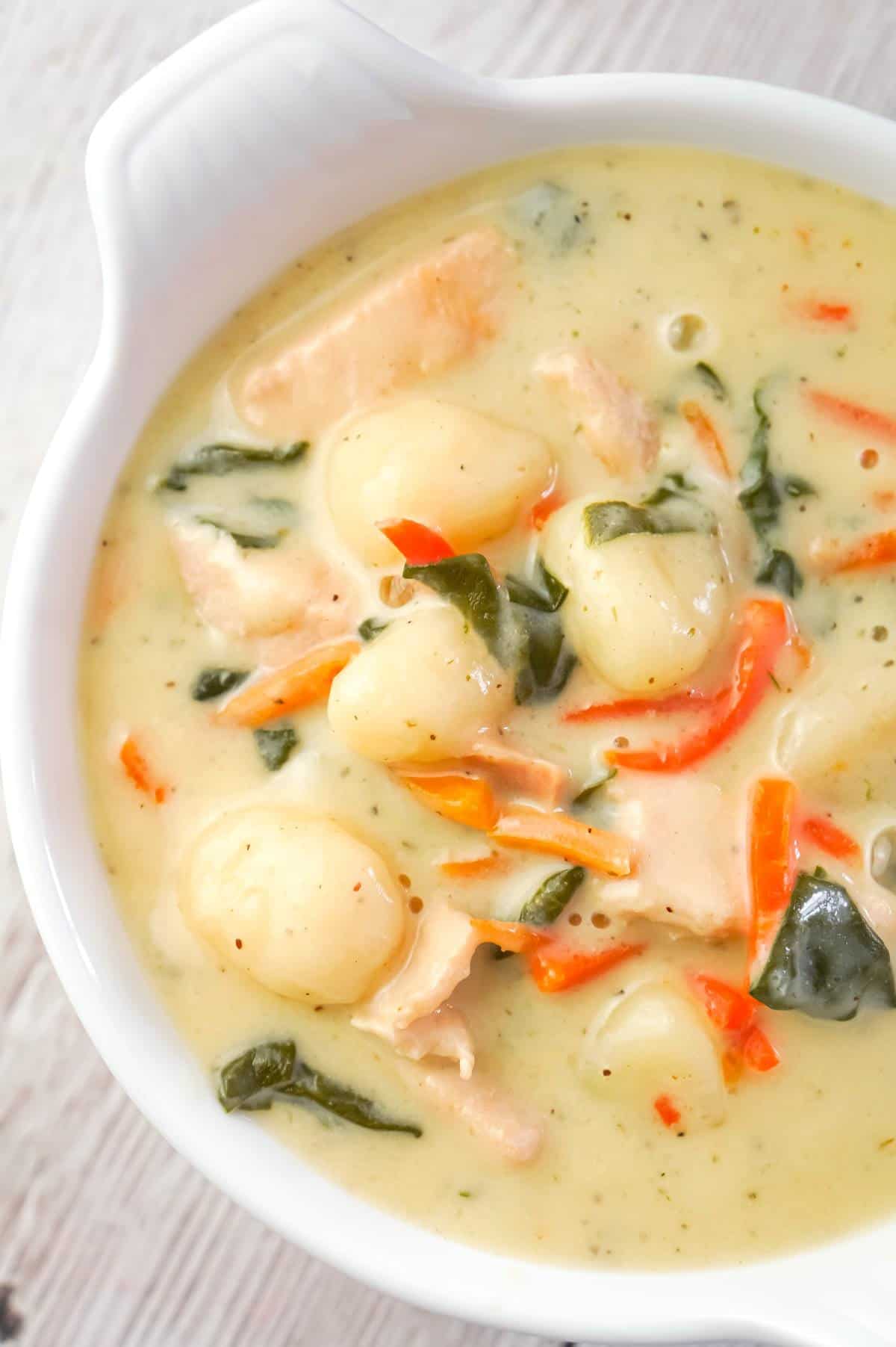 Instant Pot Chicken Gnocchi Soup is a hearty soup recipe loaded with chunks of chicken breast, potato gnocchi, carrots and shredded spinach.